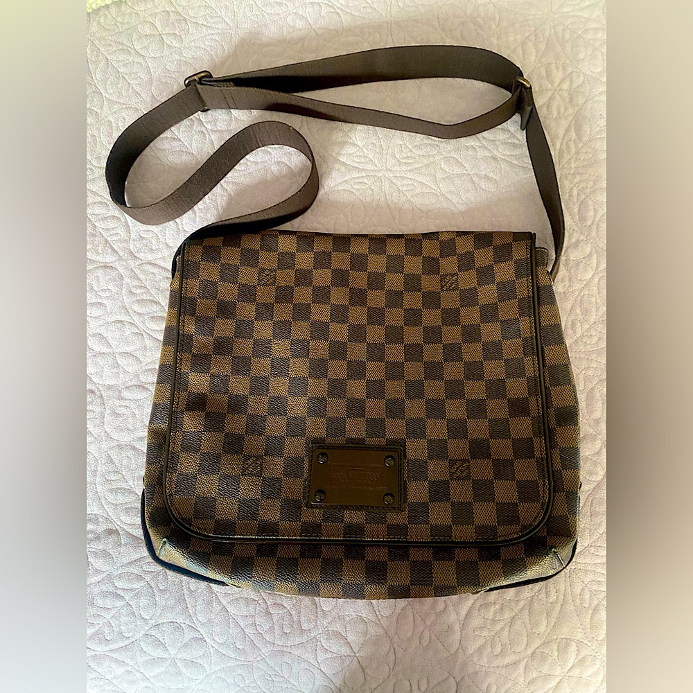 Luis Vuitton bag, great for laptop or daily use.